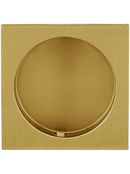 Square Pocket-Door Flush Pull in Aged Brass.